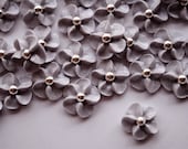 Royal Icing Drop Flowers in Silver with a silver dragee center (100)
