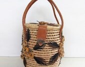 round vintage basket purse - raffia flowers and leather handle