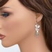 Erinite earrings, silver framed glass crystal drop, delicate orchid flower charm dangle, sterling ear wire, wedding jewelry, by balance9