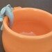 Orange mug with elephant