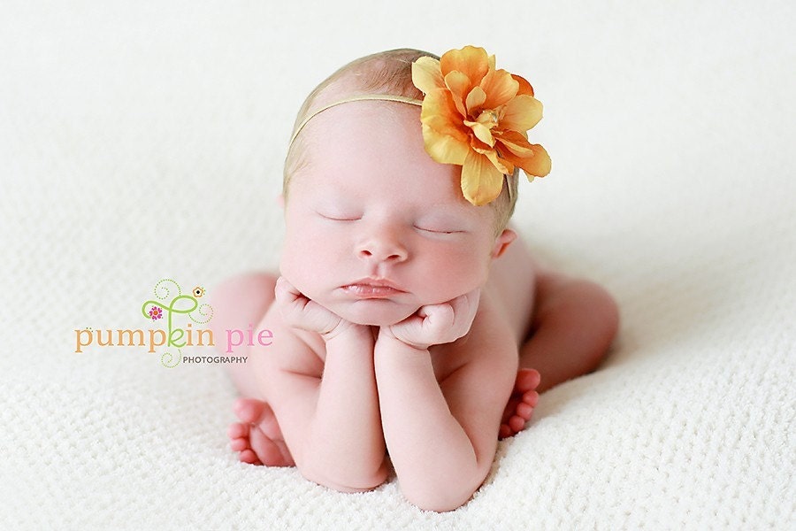 Skinny elastic orange flower headband for newborn baby or little girl, great photo prop