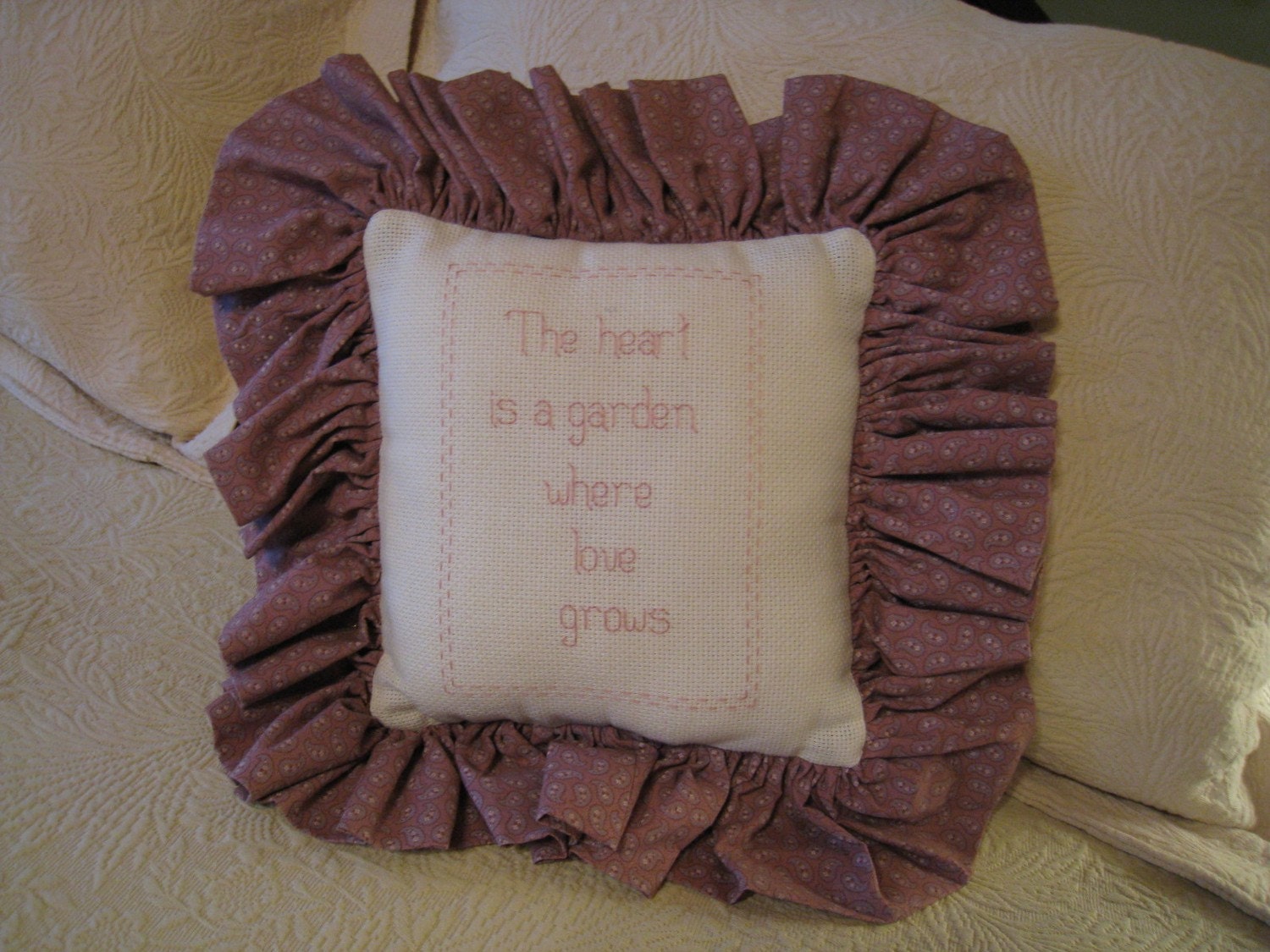 The Heart is a Garden Where Love Grows Pillow