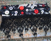 Black and white cuff with black lace and vintage buttons