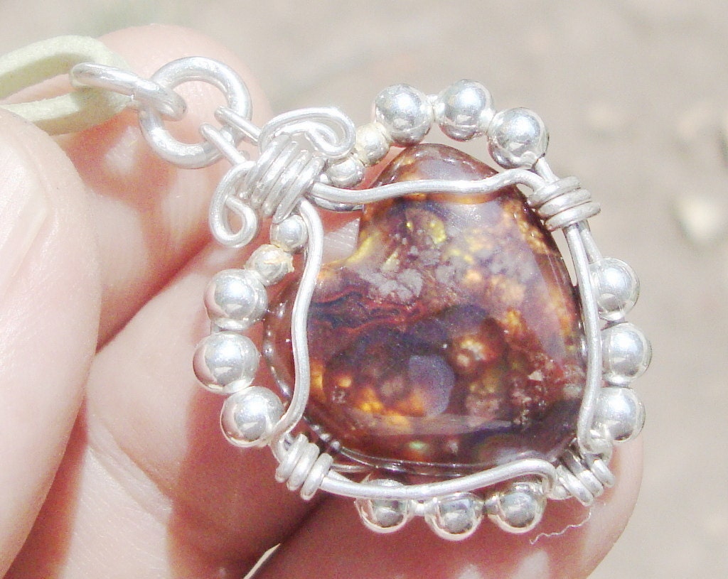 Fine Artisan Jewelry Gemstone Heart of a pending fire agate and silver  925 of 40.0 carats