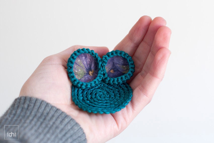 Brooch crochet circles with with fabrics. Teal blue .