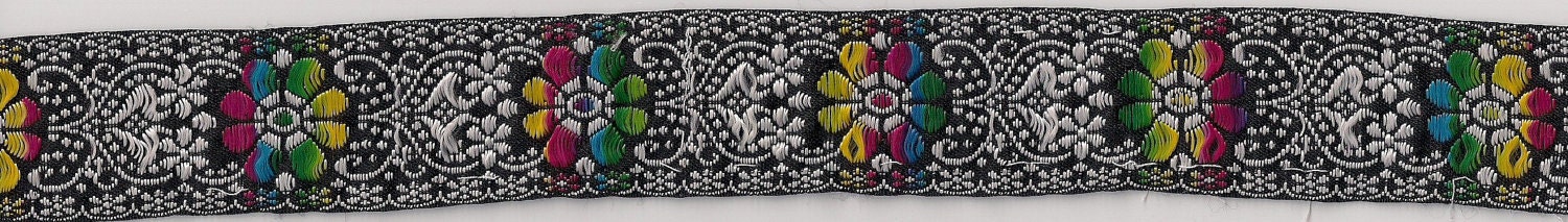 Silver Metallic Background with Rainbow Flowers Flat Trim 29 inches long