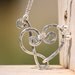Sterling Silver Treble Clef and Bass Clef Heart Pendant Necklace