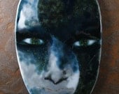 Yin and yang fused glass face.  "Where There is Dark There is Light"