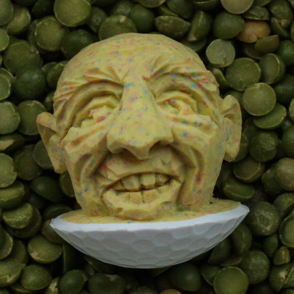 Speckled Yellow Hand Carved Bald Caricature Golf Ball