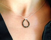 faceted black diamond teardrop necklace on sleek sterling silver cord