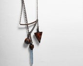 A Triangle, a Rectangle, a Sphere. A Primitive Collection of Assorted Copper Electroformed Stones.
