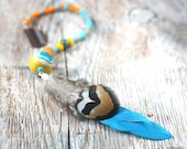 Feather hair extension - Turquoise and yellow
