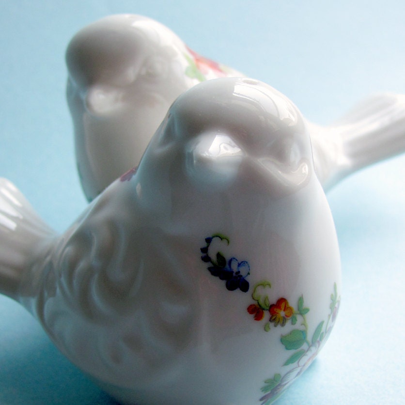 Oriental birds salt and pepper shakers with red, blue, and orange flowers