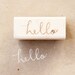 cursive hello wooden rubber stamp