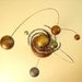 Spiral Nebula Orrery with Rings Miniature Alien Sun and Planet System in Wood