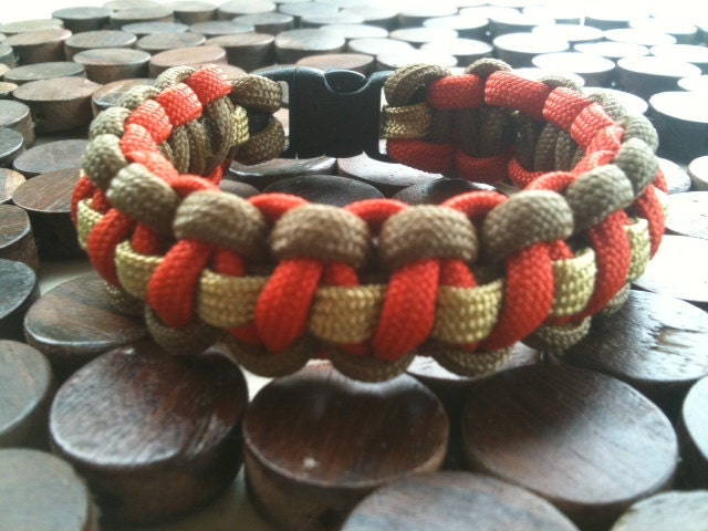 Coyote Brown and Orange Paracord Bracelet with Coyote Tan Thin Spine Coyote Brown and Orange Paracord Bracelet with Coyote Tan Thin Spine