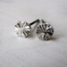 Titanium posts silver ferris wheel