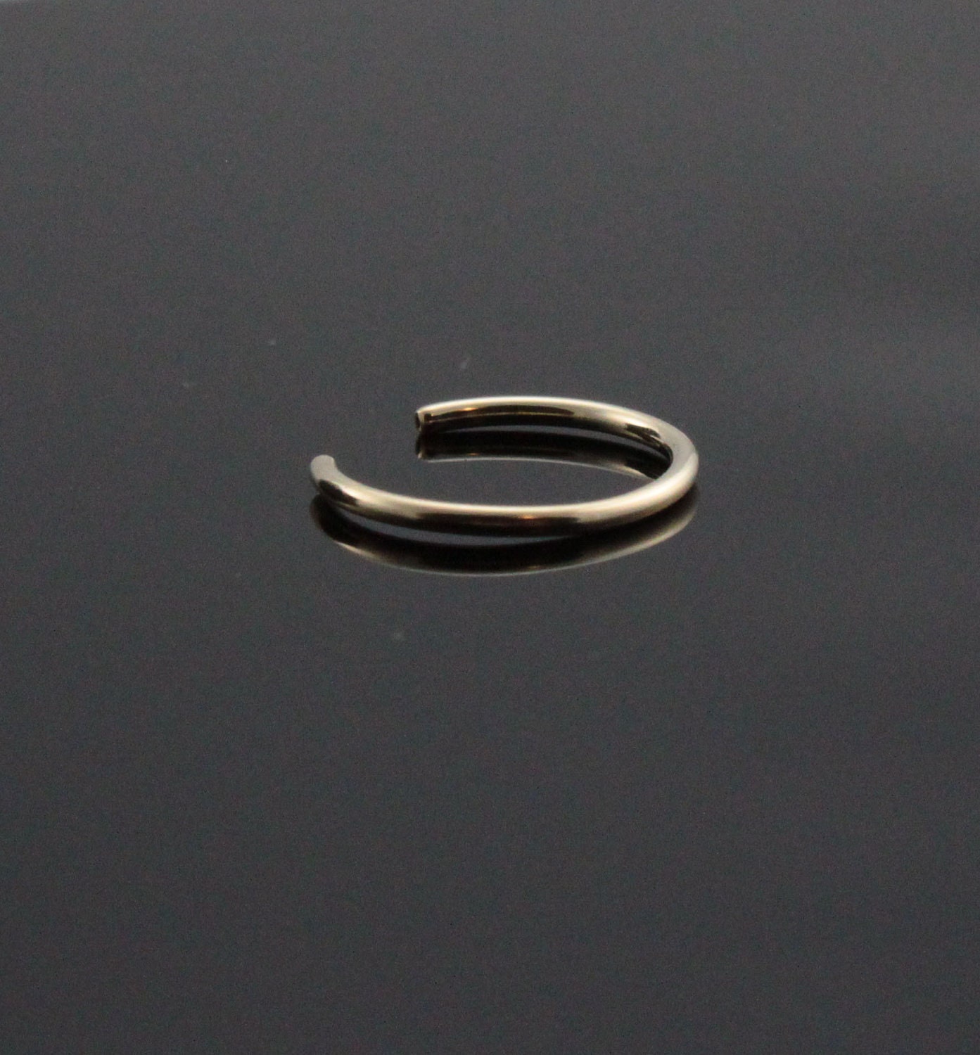 Yellow gold faux nose ring. 14K Gold filled fake hoop nosering. False tragus or cartilage piercing. No pierce Halloween teen clip on