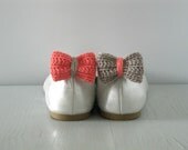 Opposites attract. Crochet bow shoe clips.Coral and sand.
