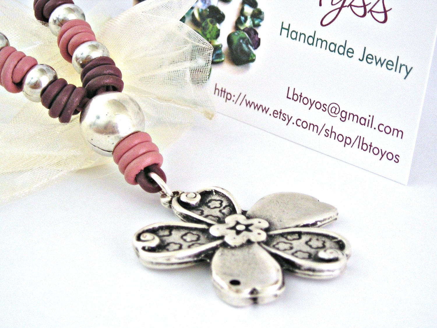 Dusty rose two tones leather necklace with zamak flower pendant