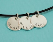 handstamped jewelry . circle charm necklace . sterling silver . leather . hand stamped charms . personalized . maryreginadesigns