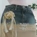 Michelle Ma Belle beige tulle vintage lace ruffled Renaissance Denim Couture bohemian jean skirt with rose and rhinestone brooch