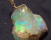 Amazing Ethiopian Opal (15.95 ct.) Pendant in 14k Yellow Gold