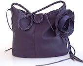 purple leather handbag with a detachable 'rose' flower, made to order.