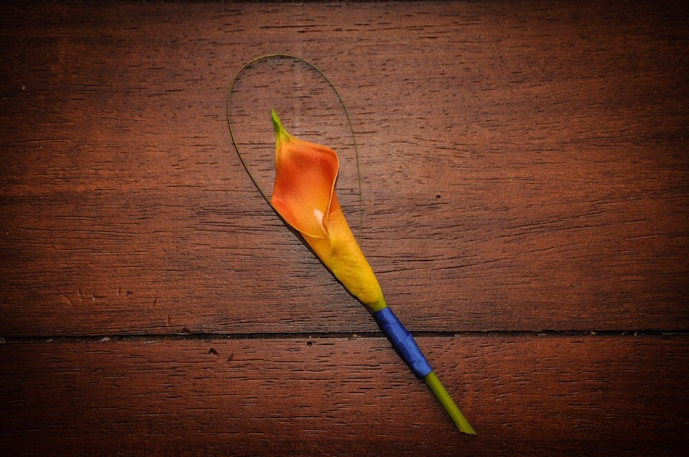 orange lily boutonniere