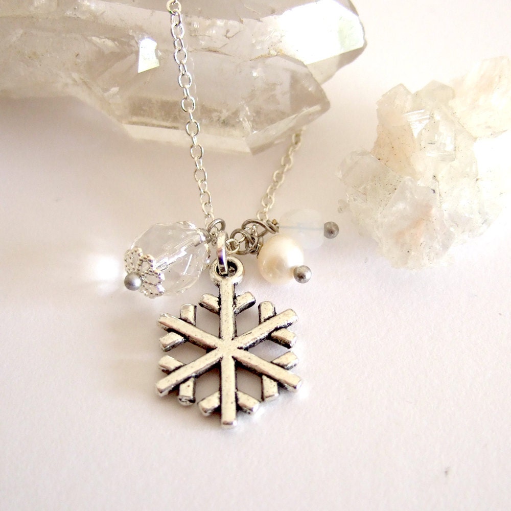 Snow white Inspired Snow flake pendant necklace with crystals and a fresh water pearl on a silver plated chain