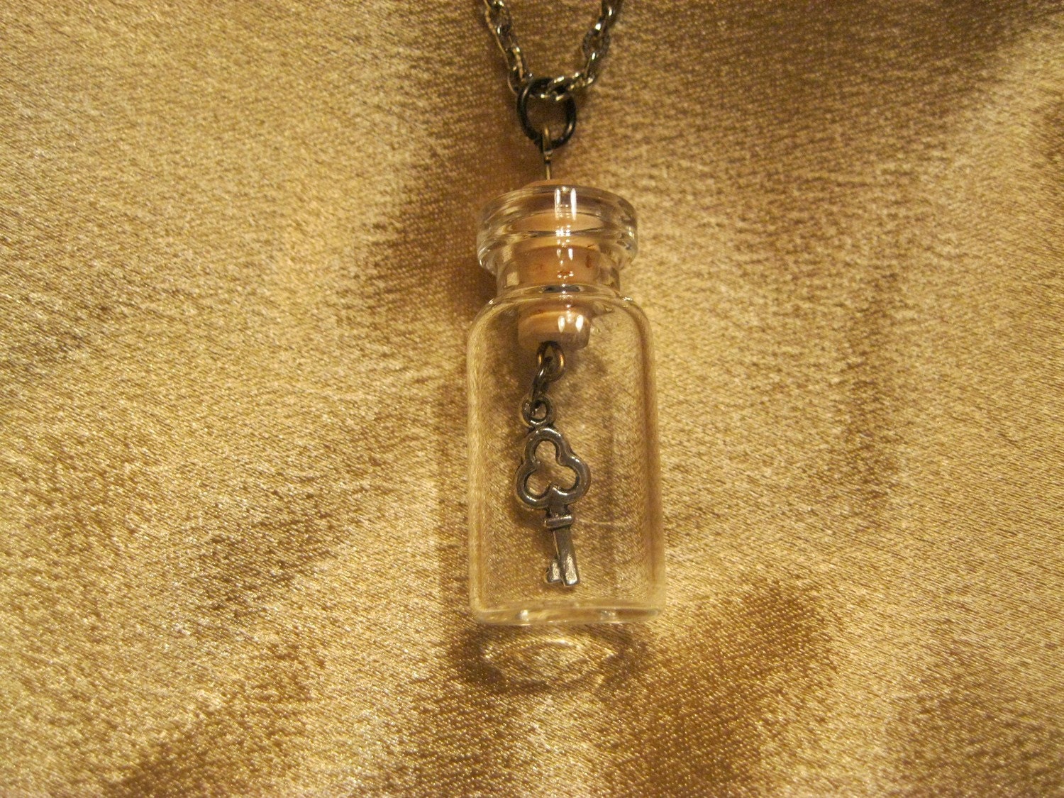 Steampunk key-in-a-bottle necklace