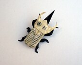 PI origami atlas beetle pin