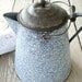 grey graniteware coffee pot