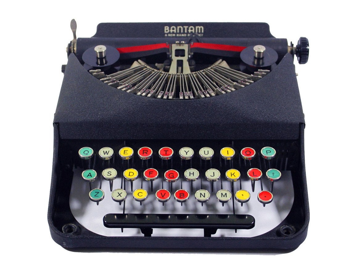 RARE Antique Bantam Manual Typewriter with Colored Glass Keys made by Remington in the Original Case