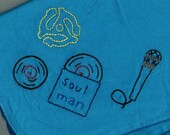 Hand-embroidered Soul Man receiving blanket