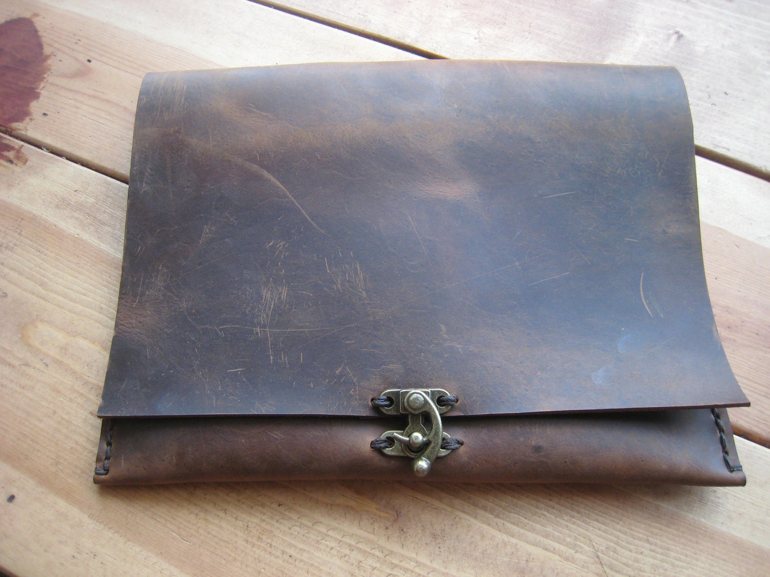 Hand made leather clutch - hand stitched by Aixa