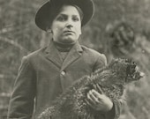 Very Weird Antique Photo of a Boy Holding a DEAD Pet Raccoon