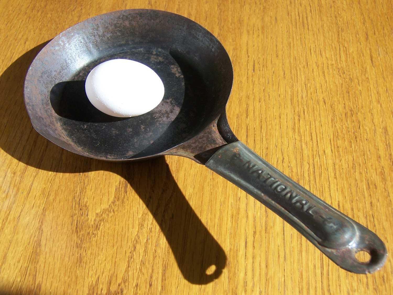 Frying Pan Antique by National is small to do an egg or two. Fun addition to a vintage shower or wedding gift basket.