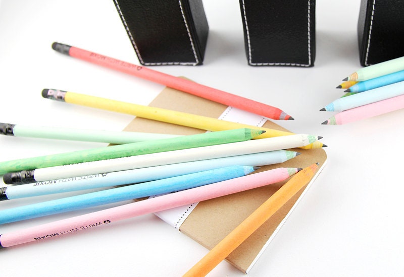 9 Piece Colorful Eco-Friendly Recycled Paper Pencils in black kraft tube - made from 100% recycled paper - great as gifts and party favors