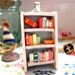 The Beach House Bookshelf Necklace by Coryographies
