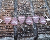Peach guitar pick bracelet