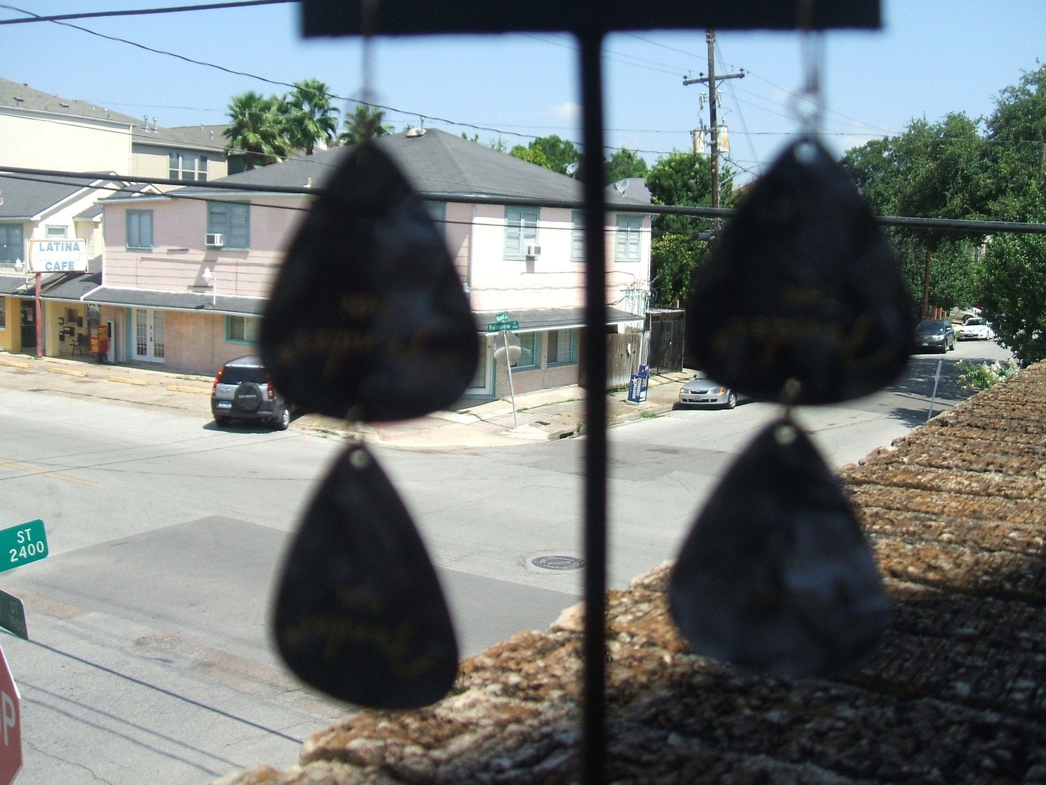 Black guitar pick earrings