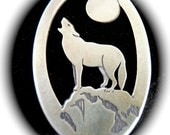 wolf animal totem reversible hand made sterling and bronze pendant
