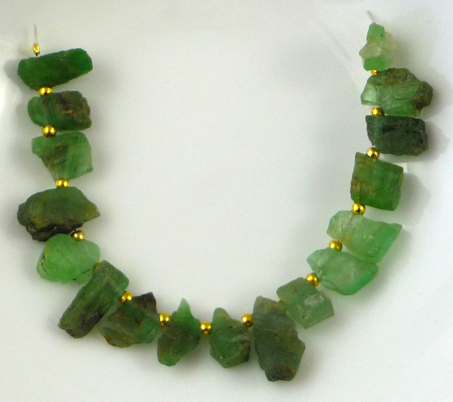 Rough emerald briolette beads 7-14mm 4 inch strand