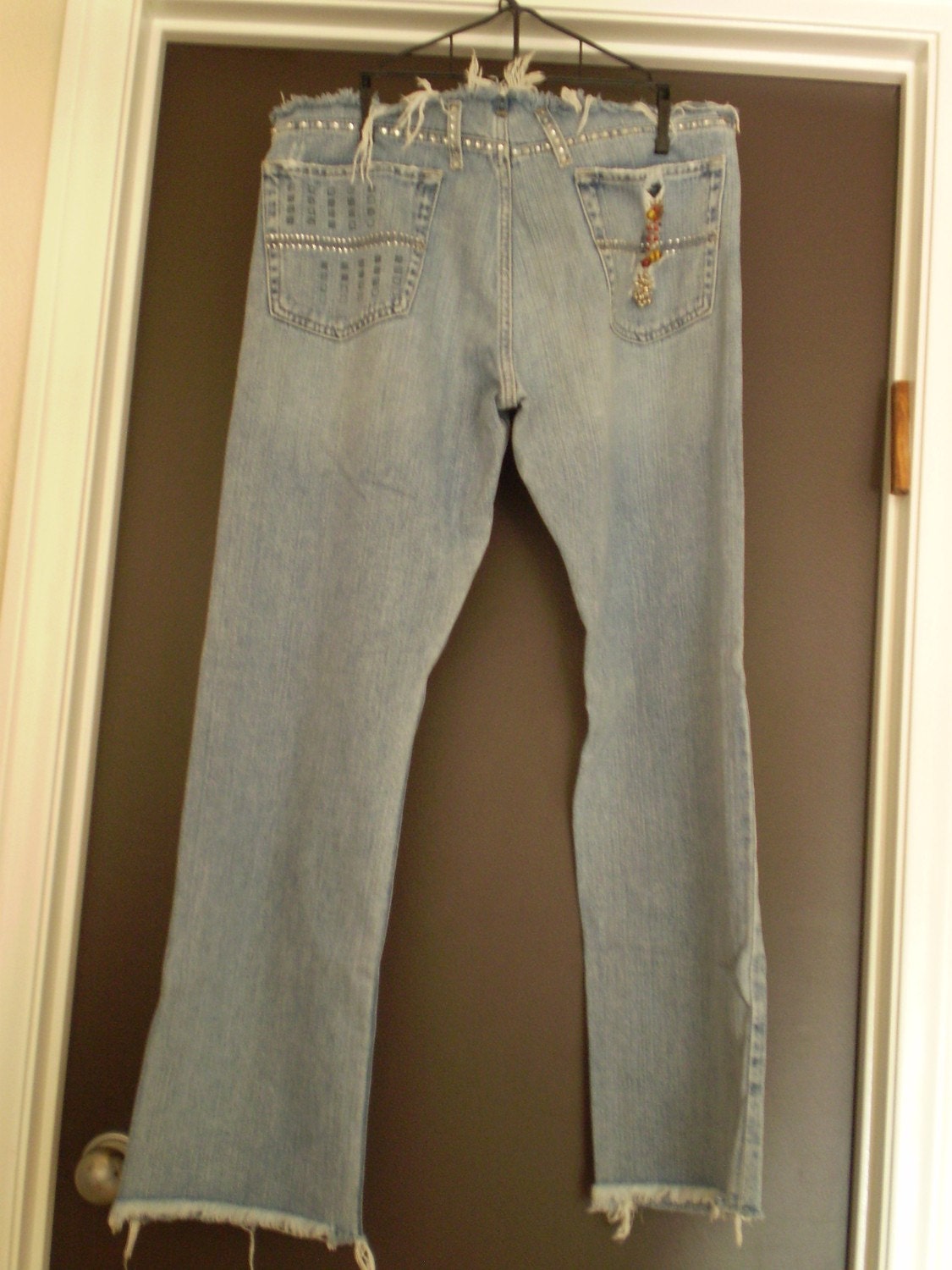 SALE upcycled referbished jeans crystal encrusted ultra low rise distressed with butterfly crystal pattern and bells