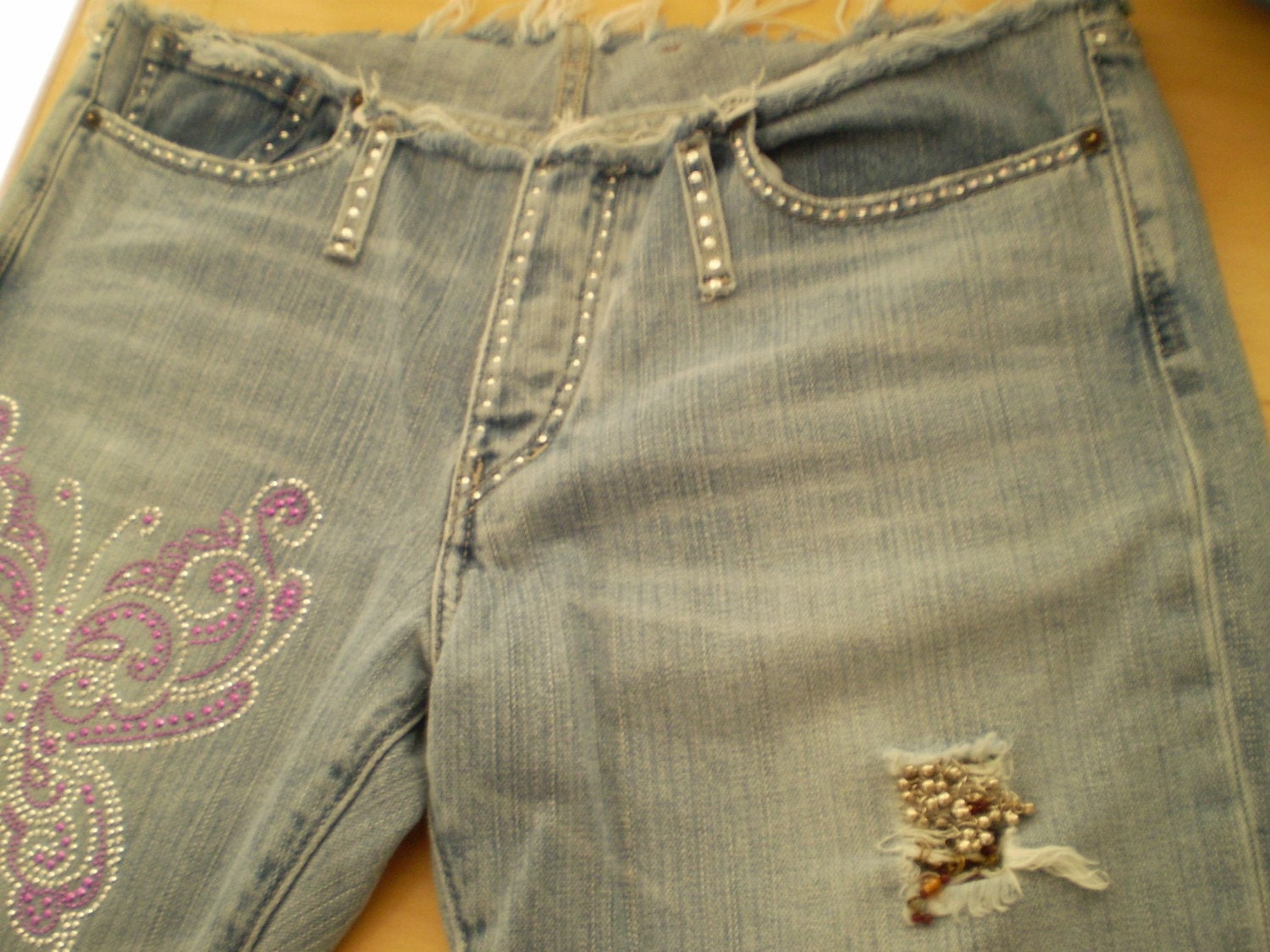 SALE upcycled referbished jeans crystal encrusted ultra low rise distressed with butterfly crystal pattern and bells