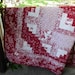 Red and white log cabin quilt