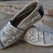 What is Love Theme - Ivory & Black Custom TOMS Shoes