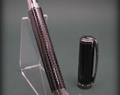 Fountain Pen. Hand cast carbon fiber and gunmetal hardware. Bold high tech looking pen.