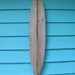 Surfboard made of recycled fence wood.  longboard, surf, outdoor art